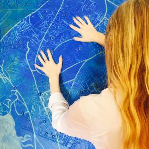 Sarah with her maps 2