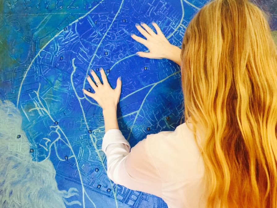 Sarah with her maps 2