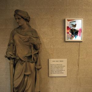 Image - Title: Virtue - Photograph on a light box - Installation (site specific); a light box installed at the statue of Lady Justice at the courthouse. overview2
