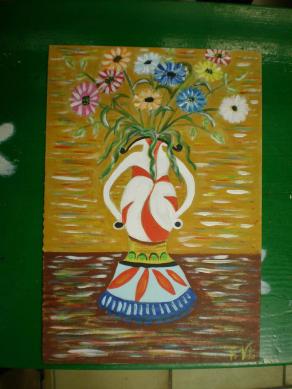 Particolare vaso con fiori variegati