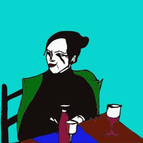 Donna seduta al tavolo