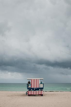 People staring at the sea