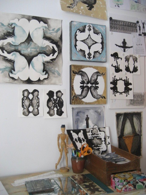 Studio wall with silhouettes