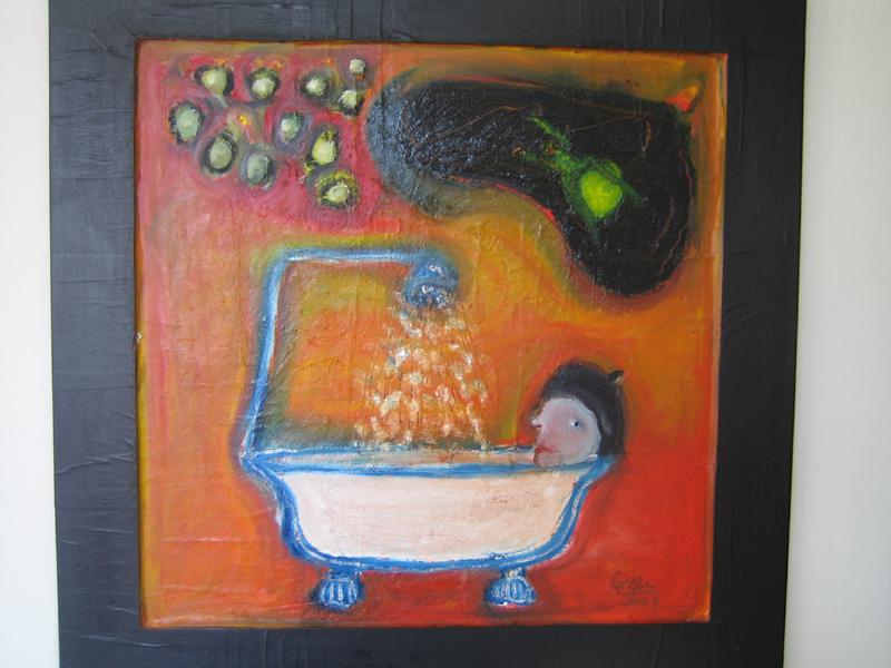 Man in a bath with green frog jumping