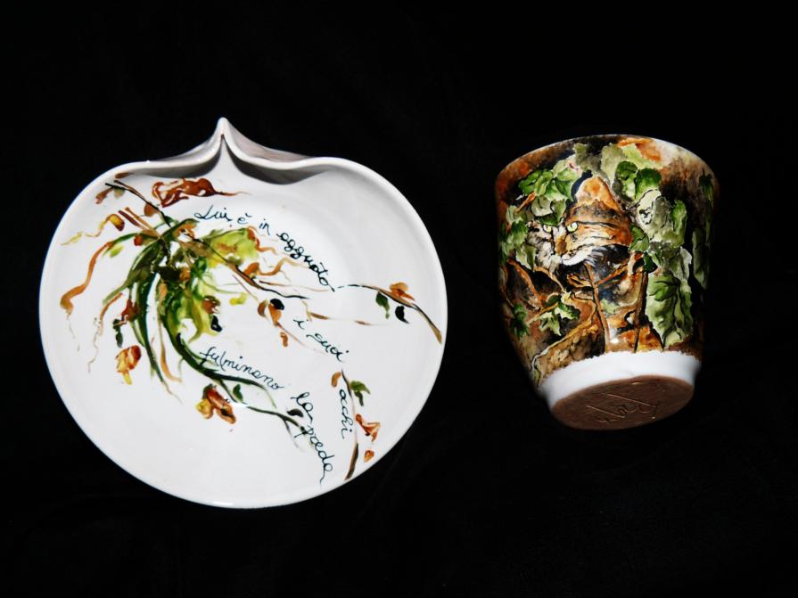 Il gatto ed una siepe in città