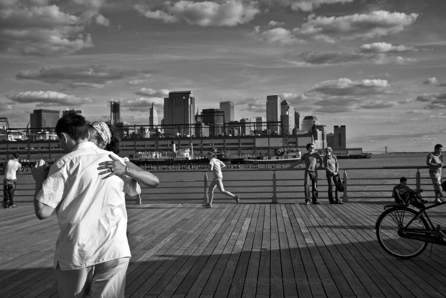 Ernesto Romano, New York, 2010. A couple dancing tango on a pier. Ernesto Romano, New York, 2010. A couple dancing tango on a pier.