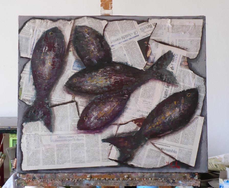 Pesci su giornale