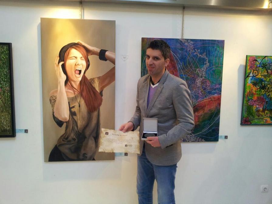 Silver medal at the exhibition given by the Estoril Open Gallery (March 2, 2013).