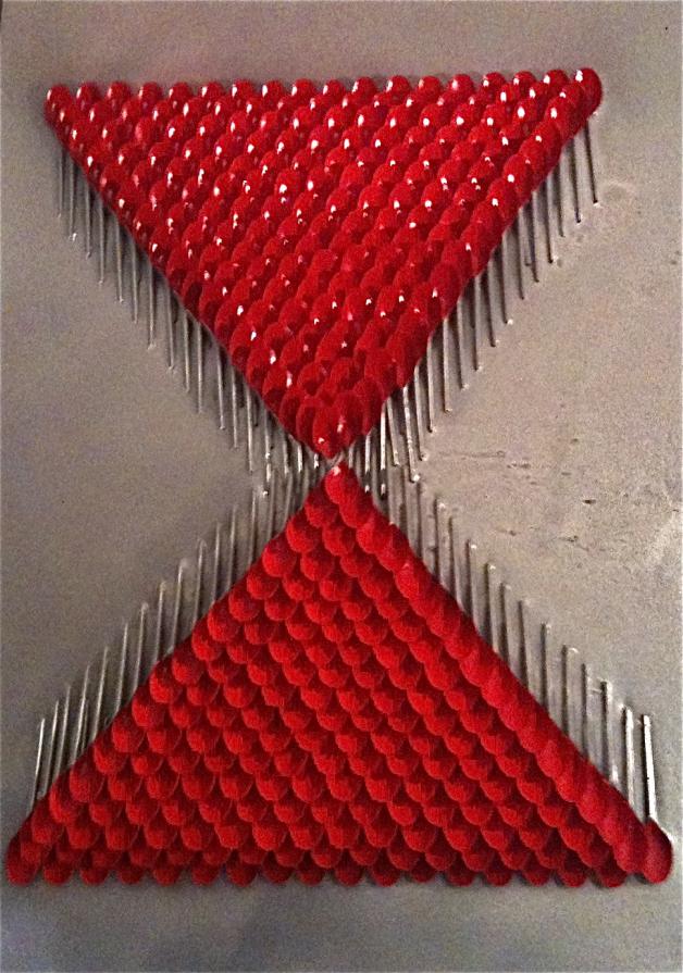 clessidra di cucchiai in plastica