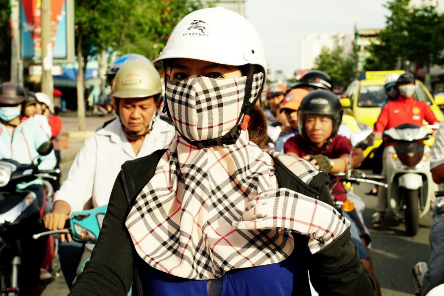 Girl with Burberry plaid accessories 