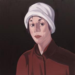 donna con cappello bianco