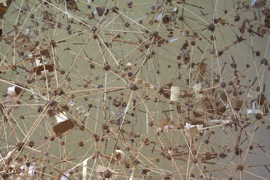 An uncertain map of the known universe made of wax, wood, clay, ropes and various paper