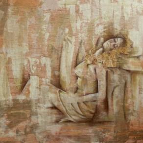 Woman leaning against a bed