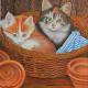Kittens in wicker basket 