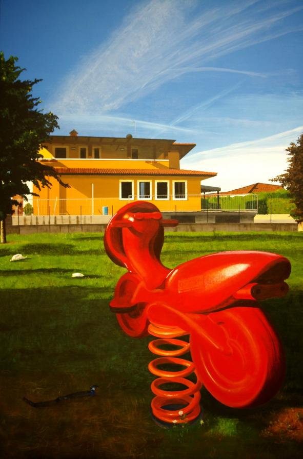 Paesaggio con giostrina rossa