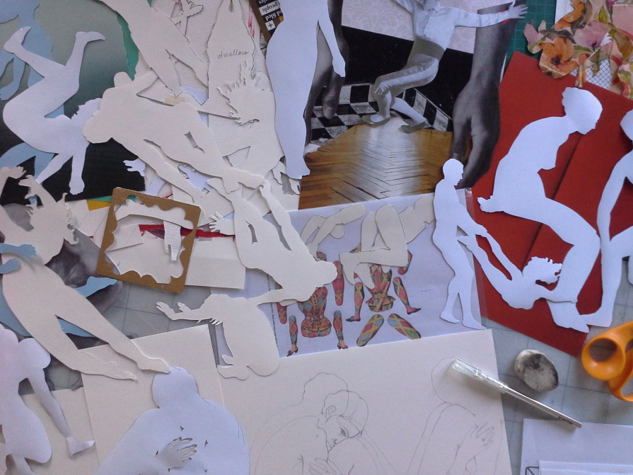 Studio table with paper dolls
