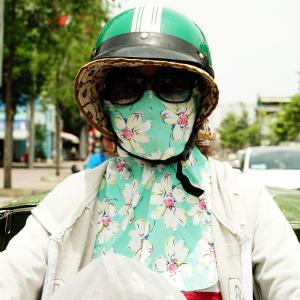 Woman with flowery mask 