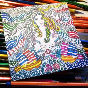 Marine. Coloring postcard. Nice girl in the sea