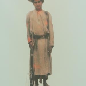 Nizwan boy with rifle