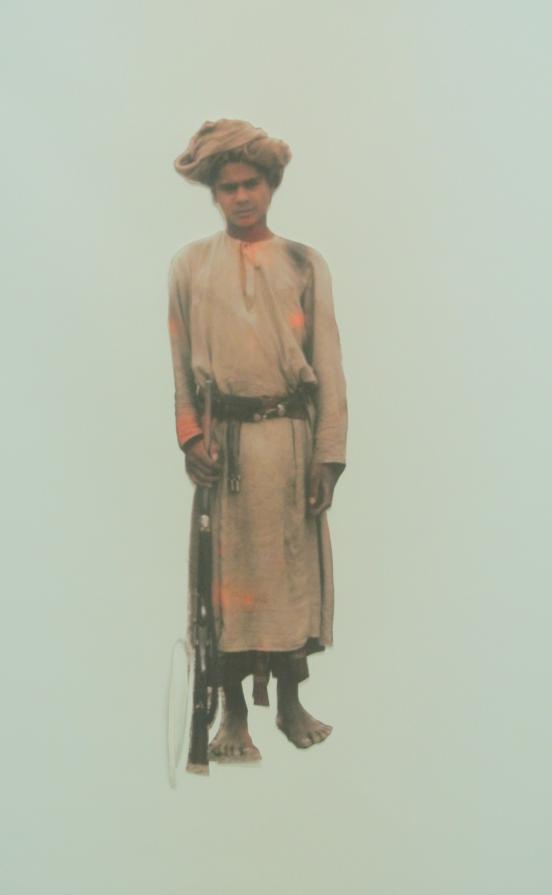 Nizwan boy with rifle