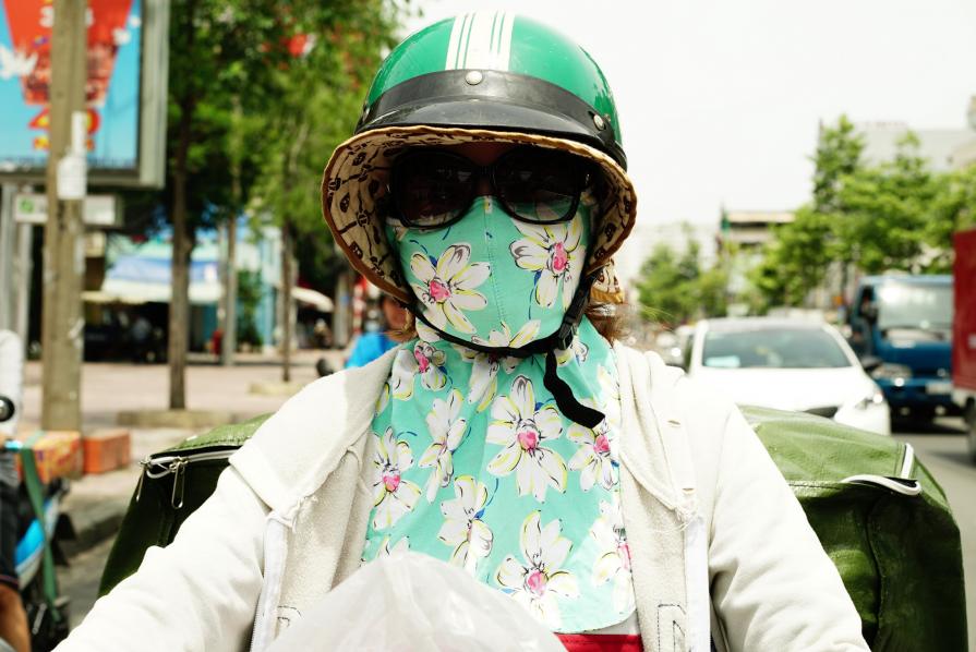 Woman with flowery mask 