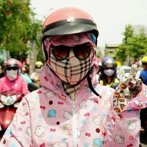 Young girl with Hello Kitty-Burberry 