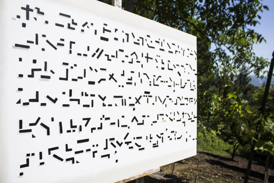 Asemic writing in P.9