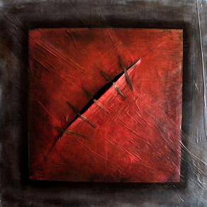 TAGLIO DIAGONALE SU ROSSO PRIMARIO (laceratio naturae)