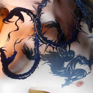 Snakes and Ladders (paper-cut superimposed on tattoo, also based on a paper-cut) Snakes and Ladders (paper-cut superimposed on tattoo, also based on a paper-cut)