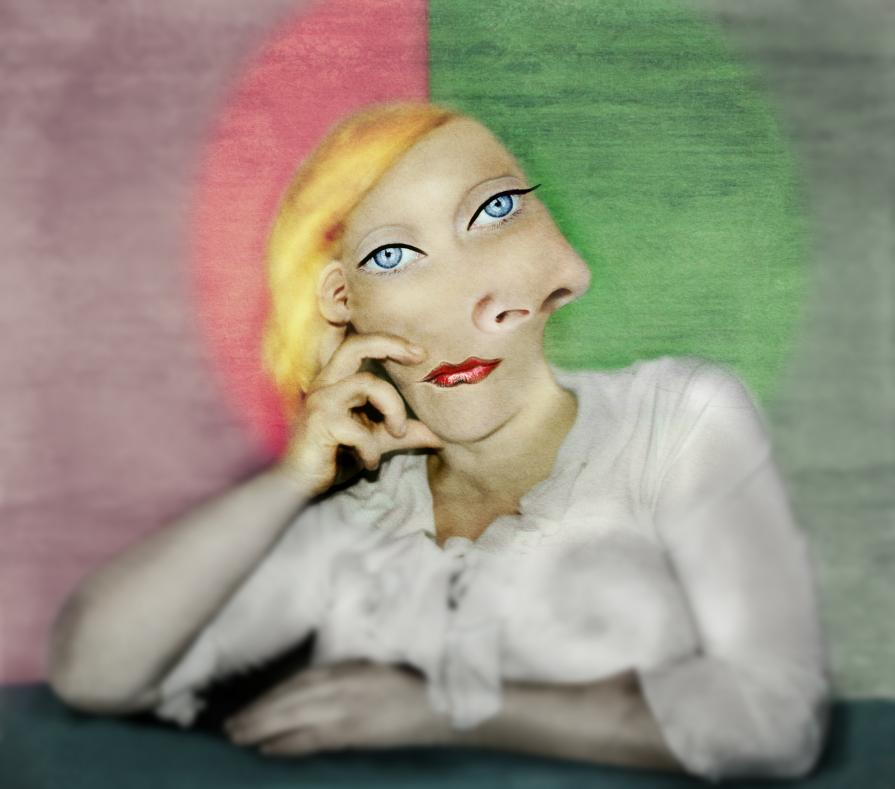 Wika leaning on one elbow