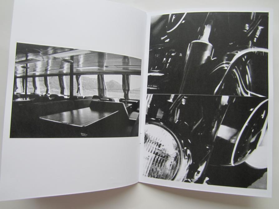 A MOTORCYCLE, A MAN AND A SHIPINTERIOR A MOTORCYCLE, A MAN AND A SHIPINTERIOR